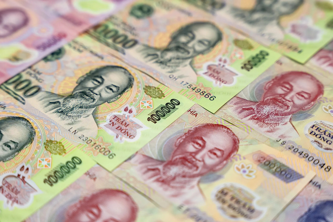 Vietnam Guides Dong Lower Amid U.S. Tariff Threats