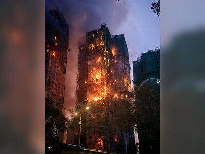 Survivor’s Escape from Hong Kong Tower Fire Gives Human Face to Tragedy