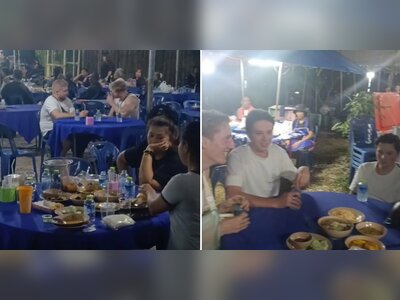 Tourists Mistake Thai Funeral for Food Hall and Are Greeted with Warm Hospitality
