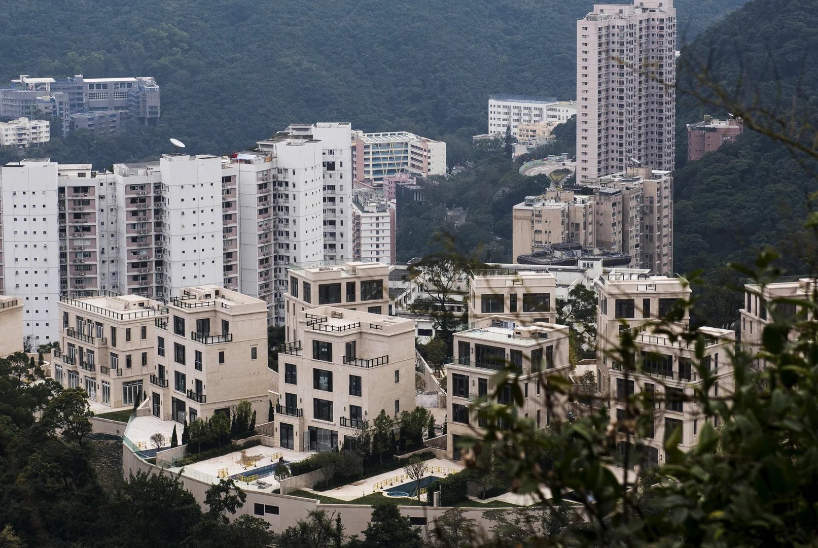 Hong Kong Tycoon’s $115 Million Property Sales Signal Strength at Top End of Luxury Market